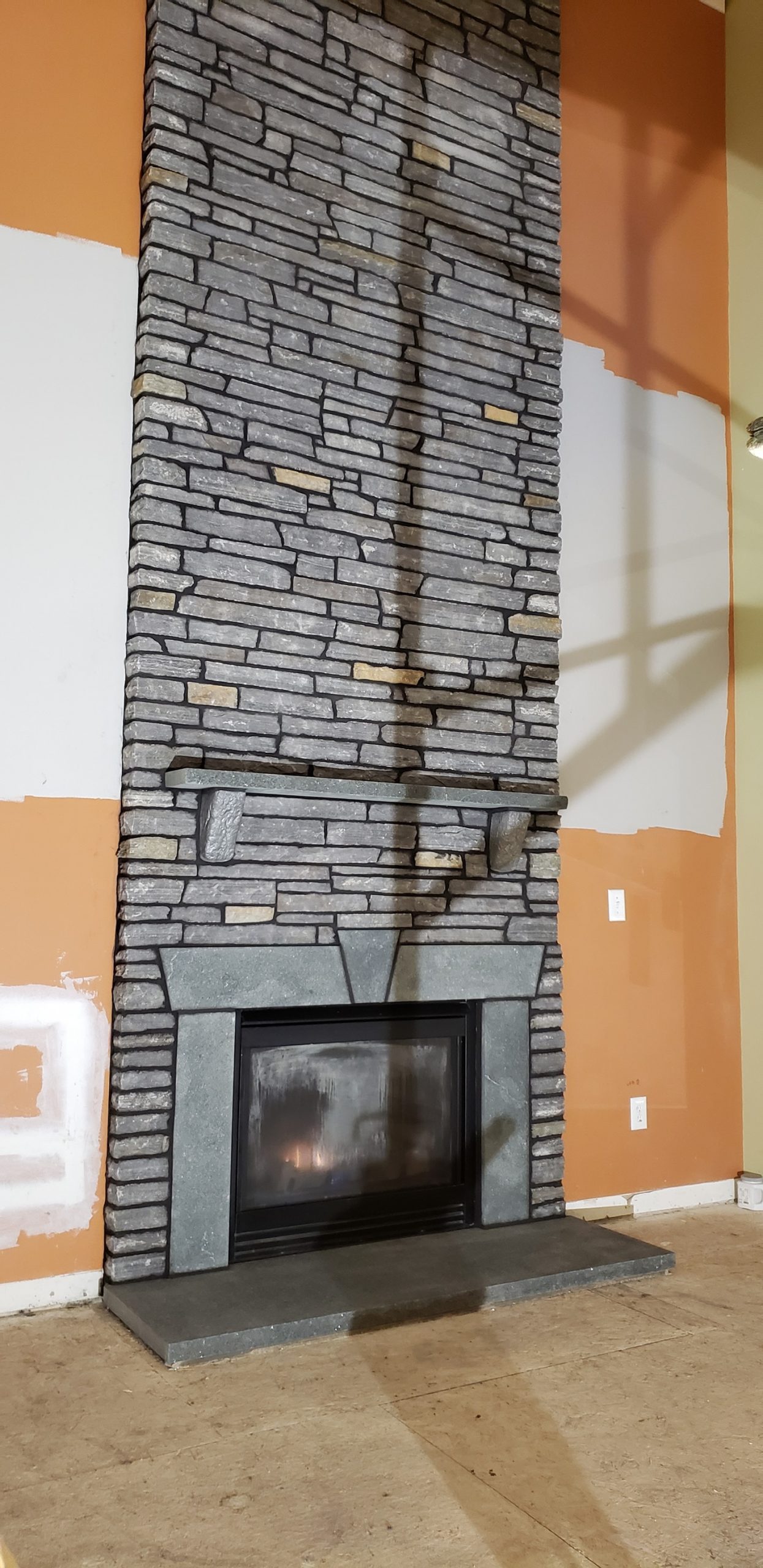 Fireplace remodel by L&L Services for a Delaware House.