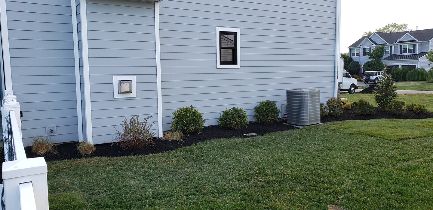 Landscape completed by L&L Services for a Delaware House.