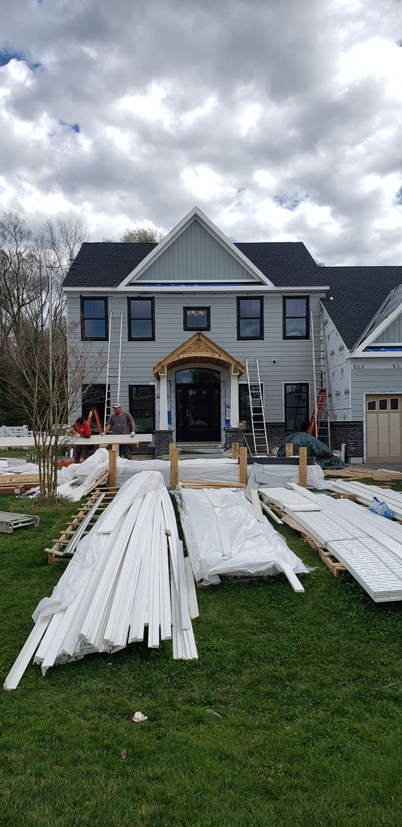 Siding installation on a home in Delaware by L&L Services.
