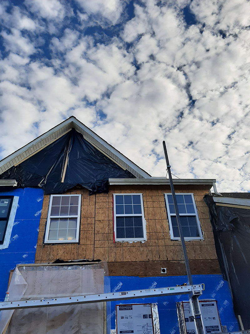 Window Installation on a home in Delaware by L&L Services.