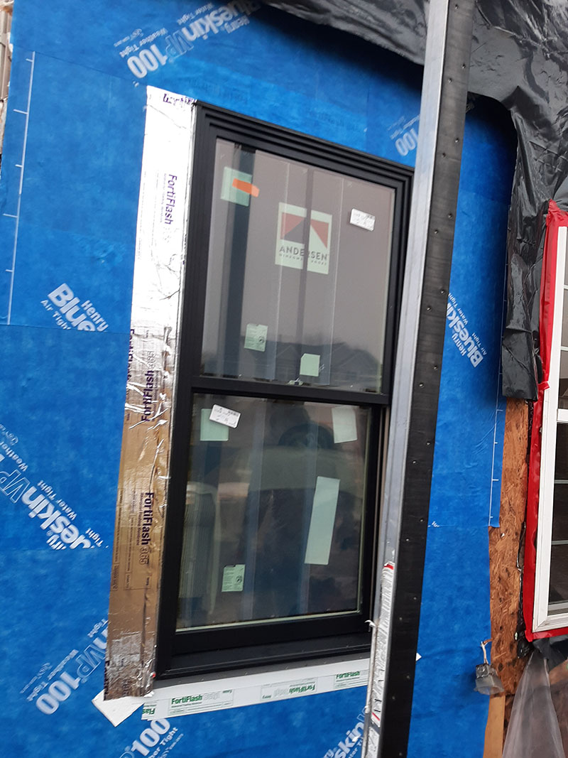 Window Installation on a home in Delaware by L&L Services.