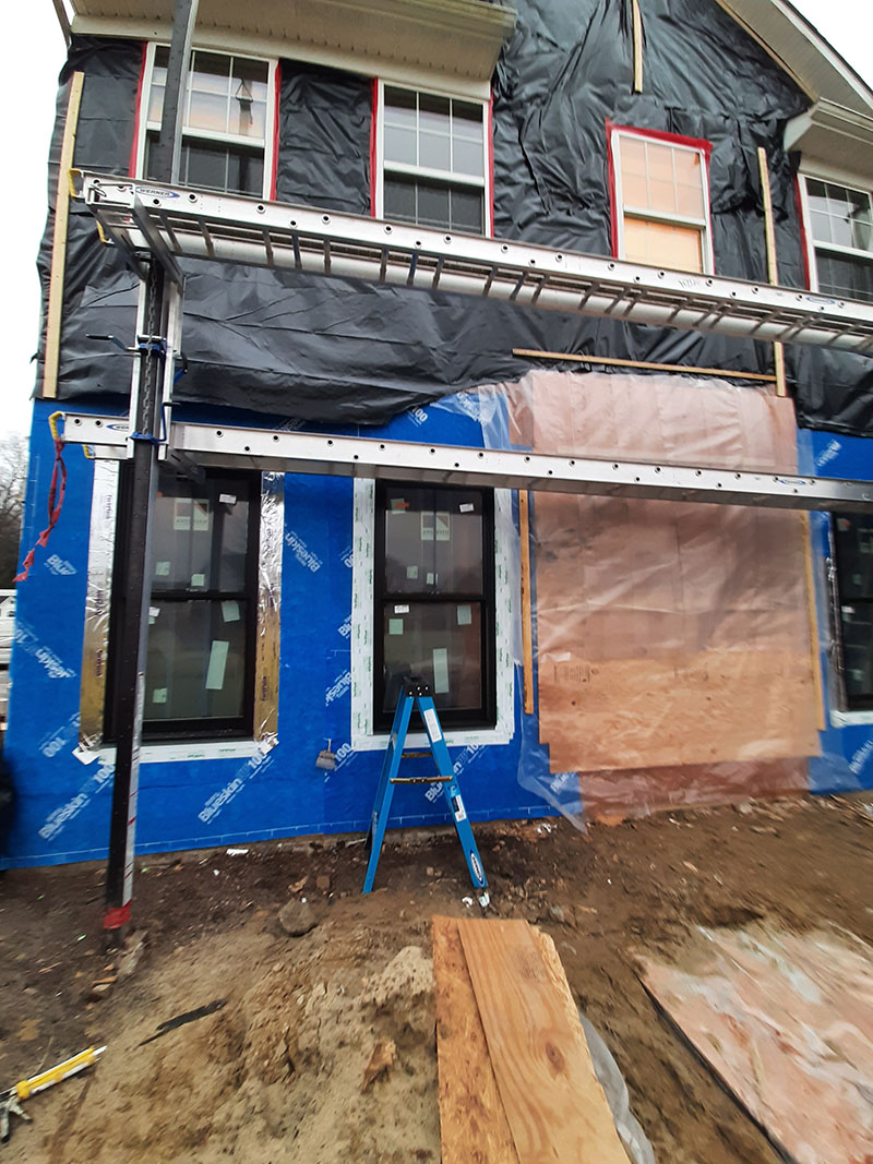 Window Installation on a home in Delaware by L&L Services.