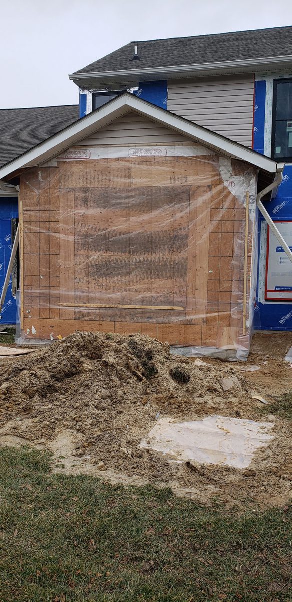 Window Installation on a home in Delaware by L&L Services.