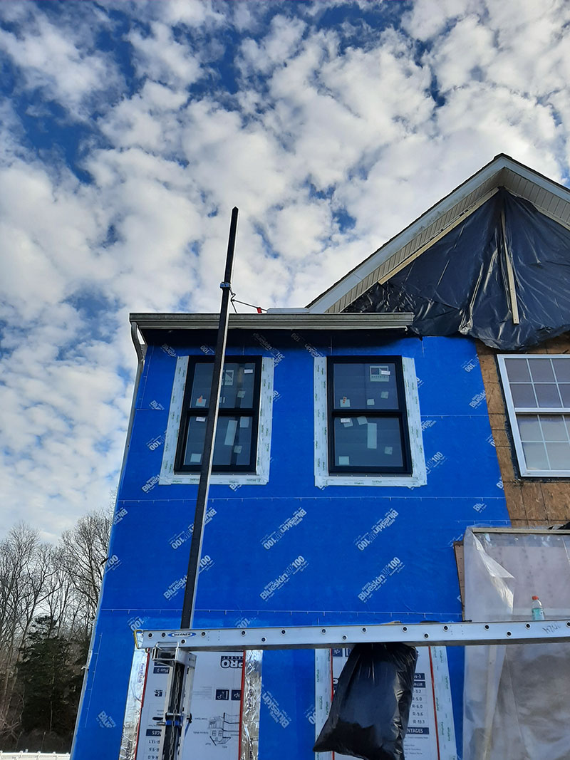 Window Installation on a home in Delaware by L&L Services.