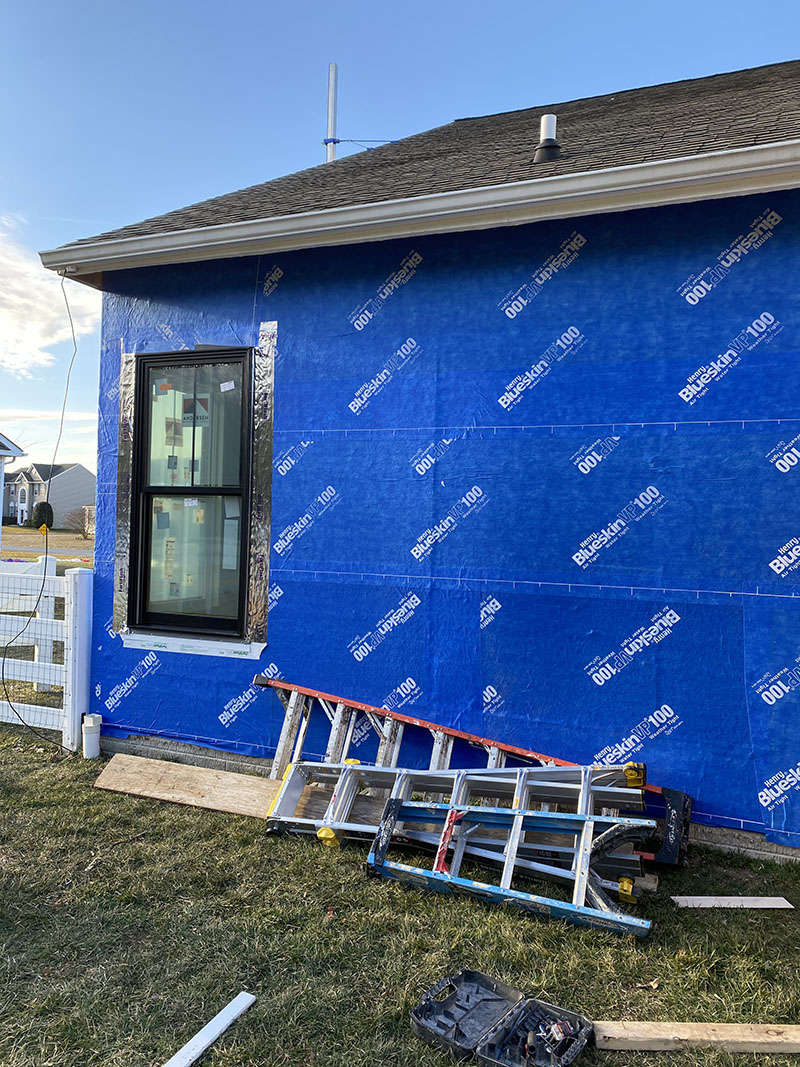 Window Installation on a home in Delaware by L&L Services.