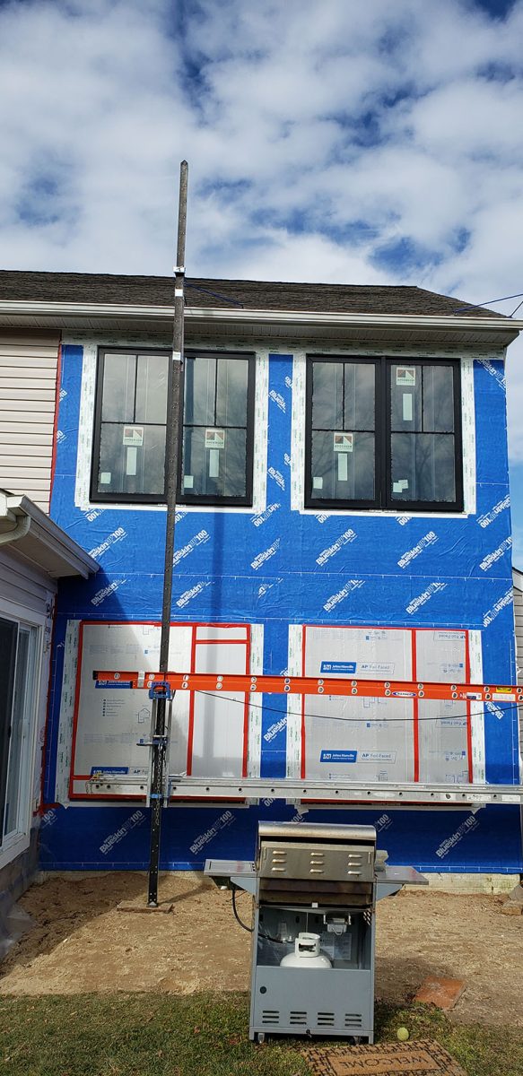 Window Installation on a home in Delaware by L&L Services.