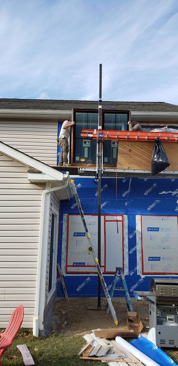 Window Installation on a home in Delaware by L&L Services.