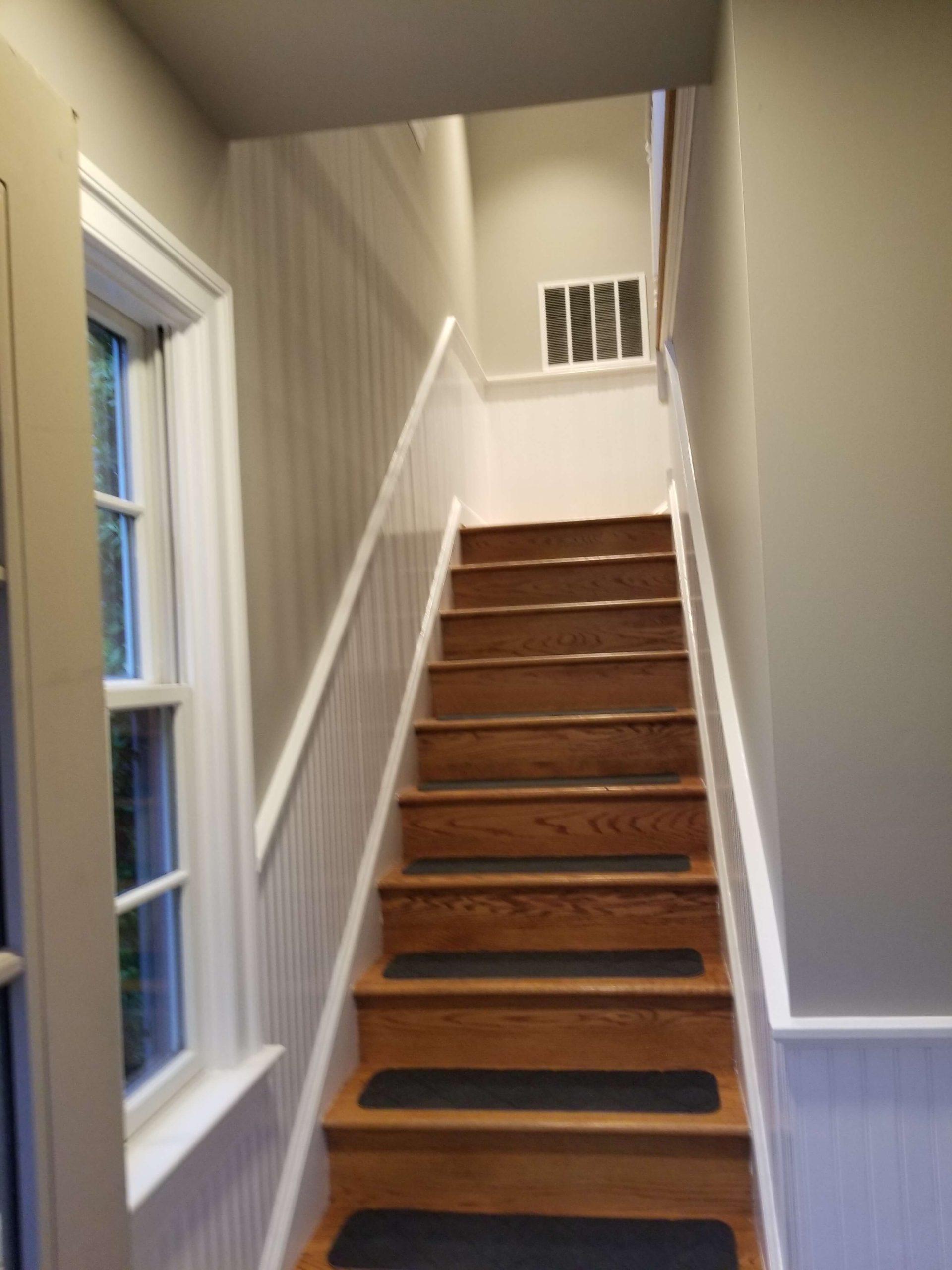 renovated staircase up to exercise room