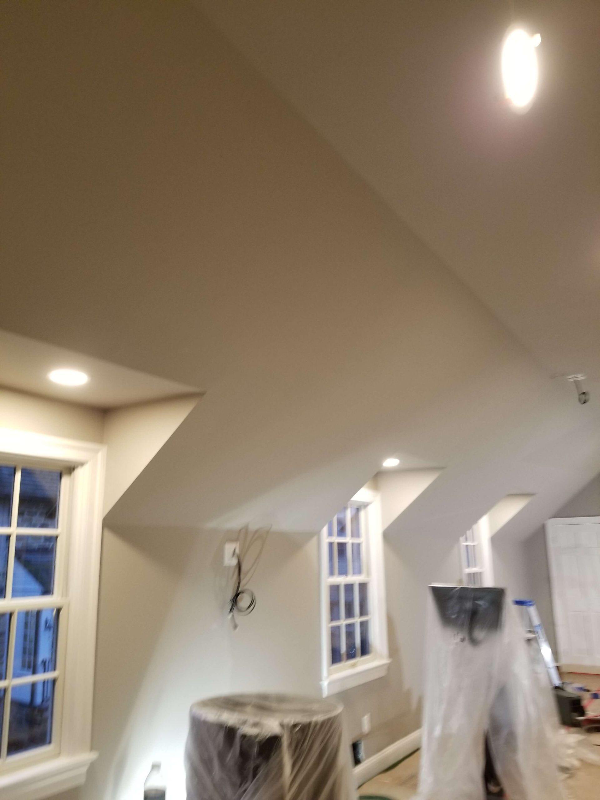 in progress raising of the ceiling and accounting for windows in an exercise room