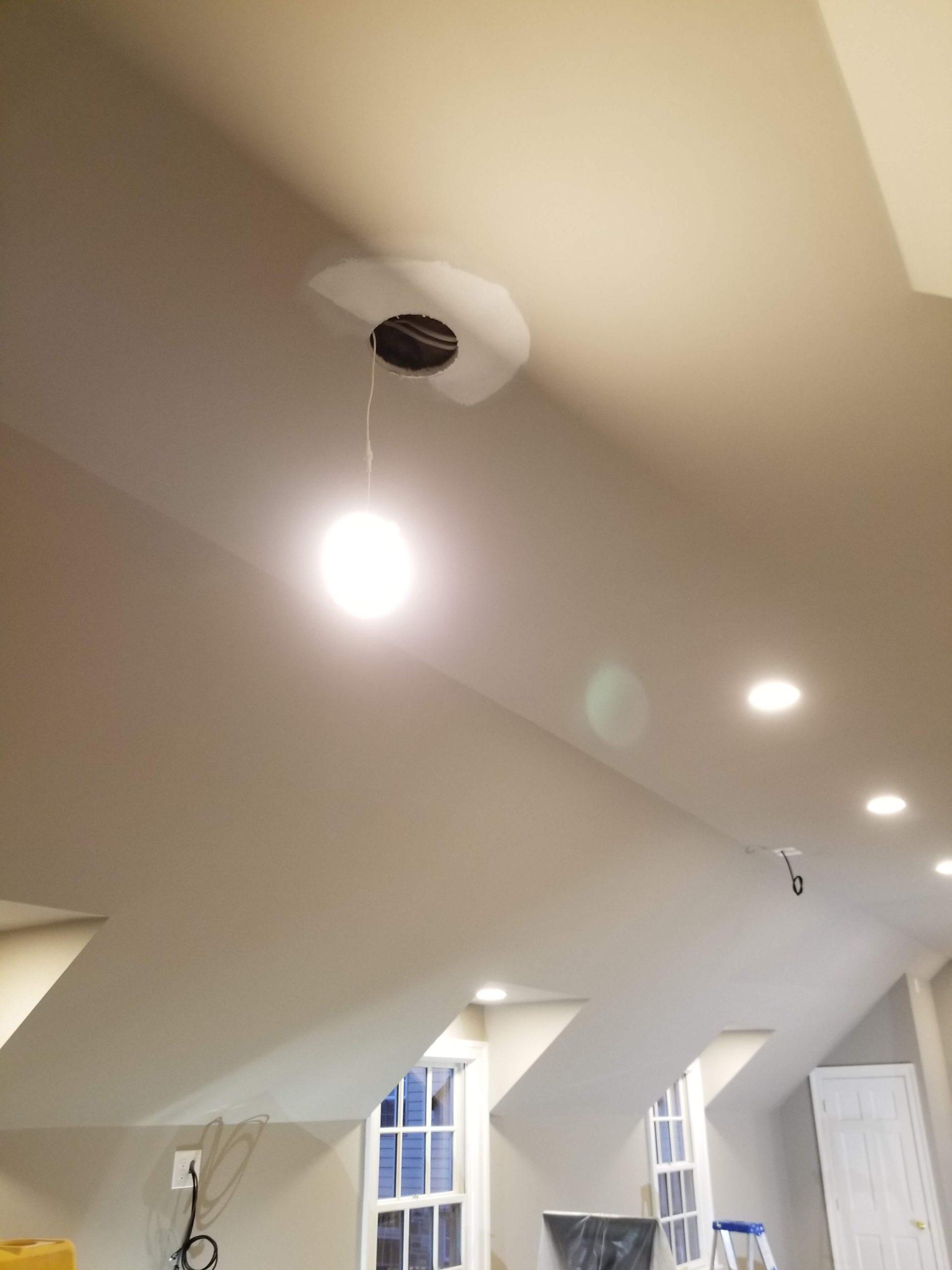 lighting installation in newly raised ceilings