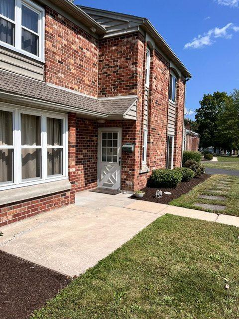 front door and small patio