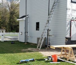 Siding installation on a home in Delaware by L&L Services.