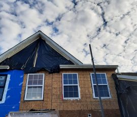 Window Installation on a home in Delaware by L&L Services.