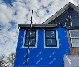 Window Installation on a home in Delaware by L&L Services.