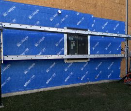Window Installation on a home in Delaware by L&L Services.