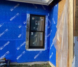 Window Installation on a home in Delaware by L&L Services.