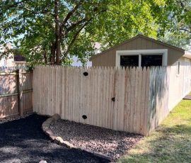 fence access to larger storage shed