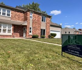 l and l contracting yard sign outside this new home
